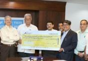 AAI PRESENTS DIVIDEND CHEQUE TO MINISTER
